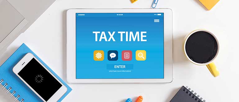 TAX TIME CONCEPT ON TABLET PC