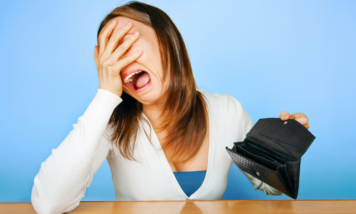 Woman Crying with empty wallet